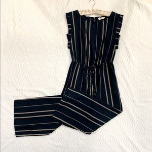 Super cute and flattering navy and tan striped jumpsuit, worn once